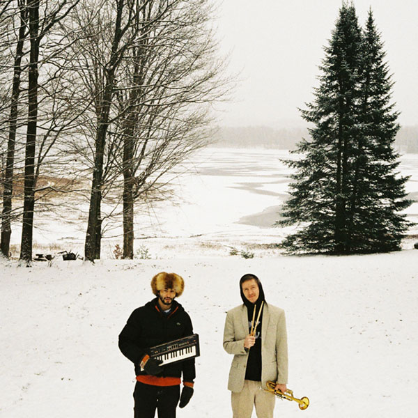Two French Hunk Musicians on a lake in the winter in the Adirondacks Upstate NY Jam Songs Mika and Zach