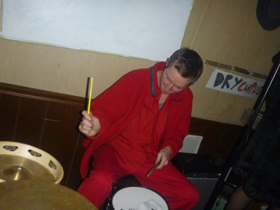 zach plays drums at the Dry Campus party by Zach Surp